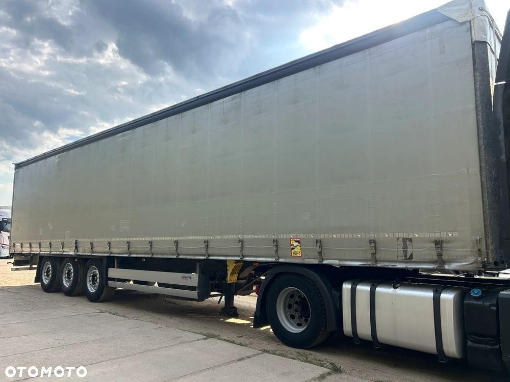 Schmitz Cargobull FIRANKA / 20 SZTUK WYBÓR / KAMERA COFANIA / ŁADNE OPONY / Z PEŁNYM WYPOSAŻENIEM DO ZAŁADUNKU / DOSTĘPNE KOLORY SREBRNY - NIEBIESKI - CZERWONY !! - 16