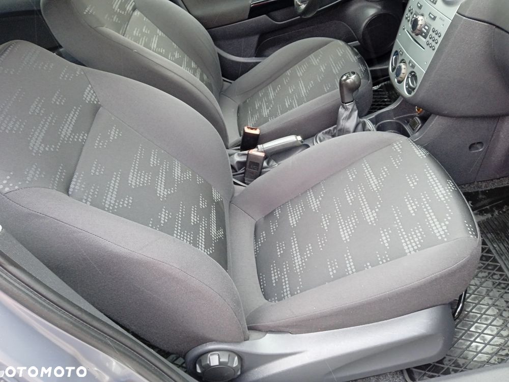 Opel Corsa 1.2 16V Cosmo - 12