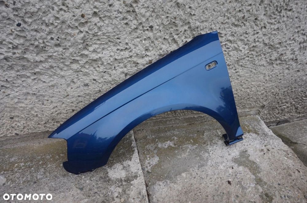 BŁOTNIK PRZEDNI LEWY AUDI A3 8P LZ5C 03/08r