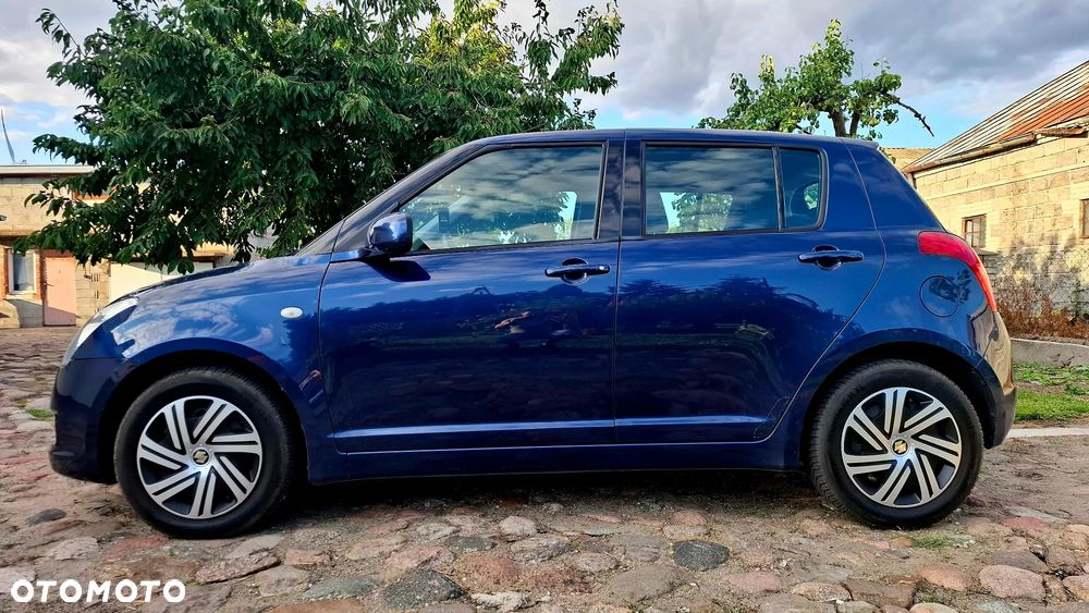 Suzuki Swift 1.3 Club - 11