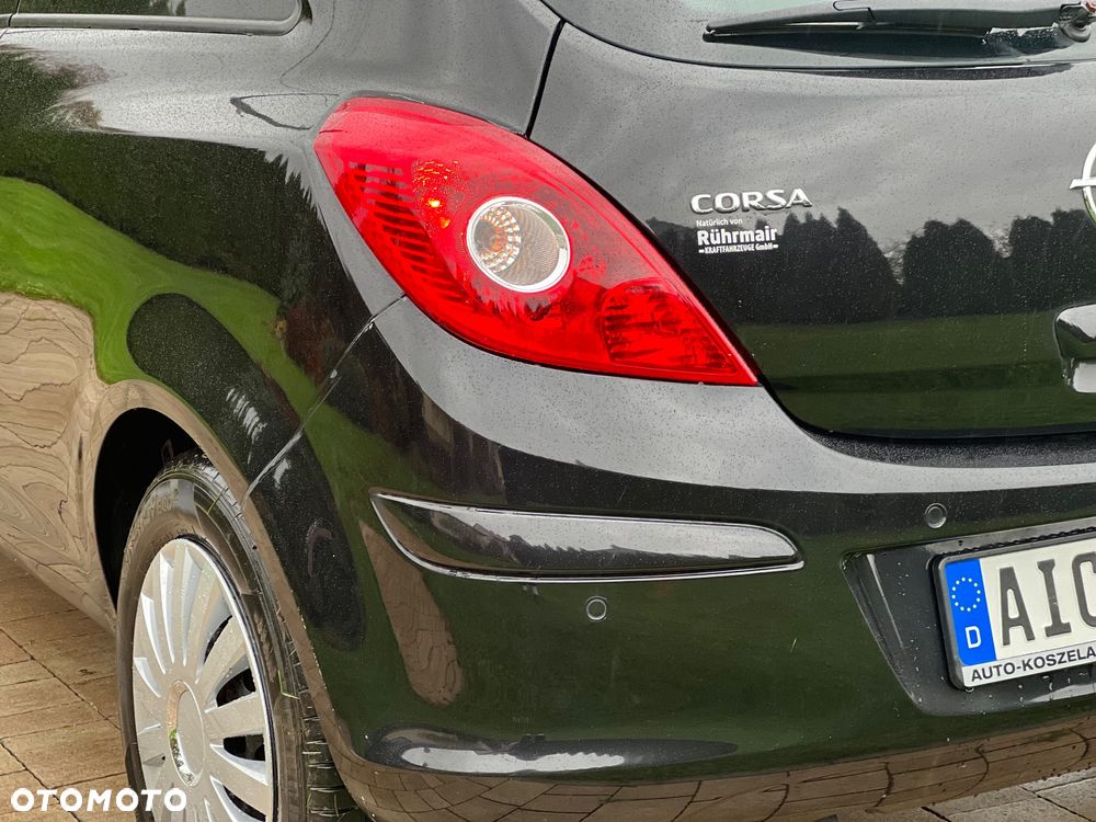 Opel Corsa 1.4 16V Enjoy - 21