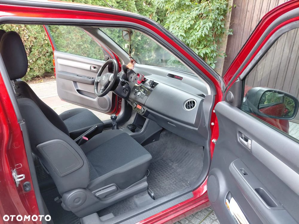 Suzuki Swift 1.3 Club - 11