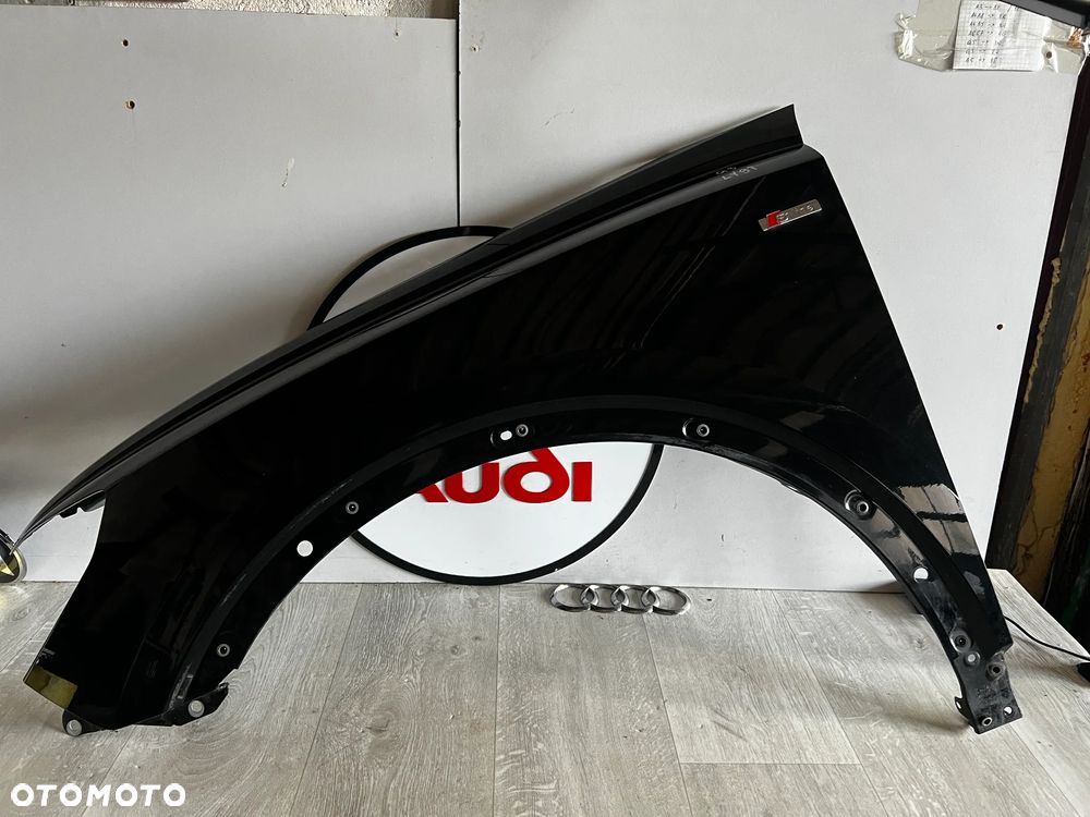 BŁOTNIK AUDI Q3 83F LEWY LY9T S-LINE  **