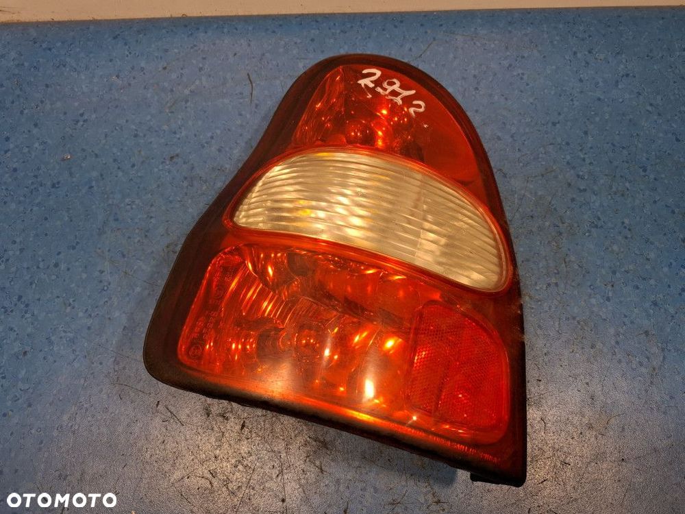 KIA CARNIVAL LAMPA TYŁ LEWA ZEWNĘTRZNA - 1