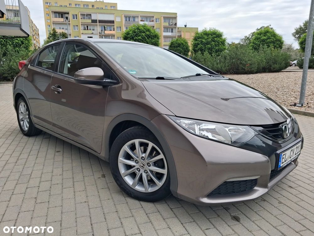 Honda Civic 1.4 i-VTEC Comfort 40 Jahre Edition - 8