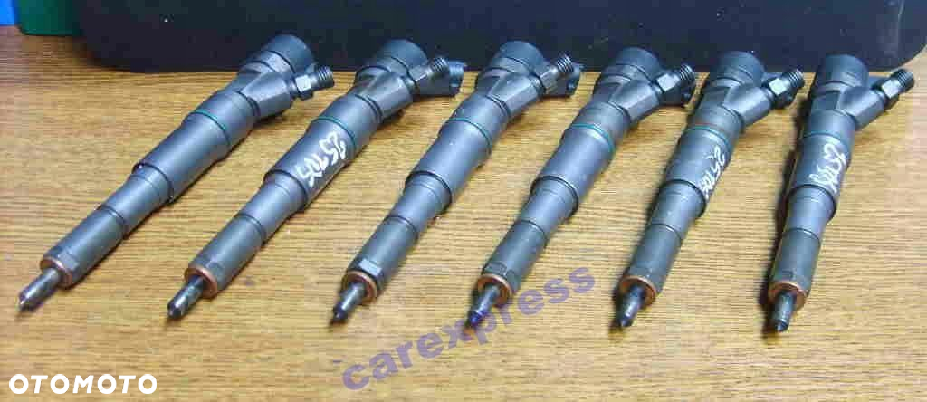 WTRYSKIWACZ LAND ROVER BMW OPEL 2.0 TD4 044511049 - 2