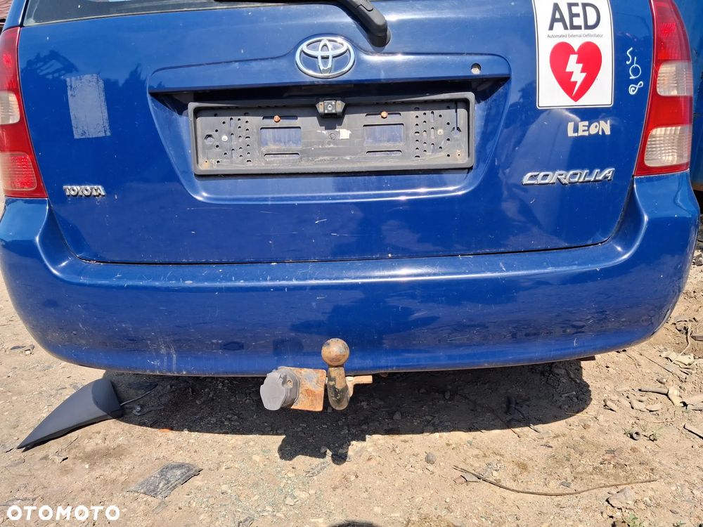 TOYOTA COROLLA E12 KOMBI 8Q4 ZDERZAK TYLNI TYL - 1
