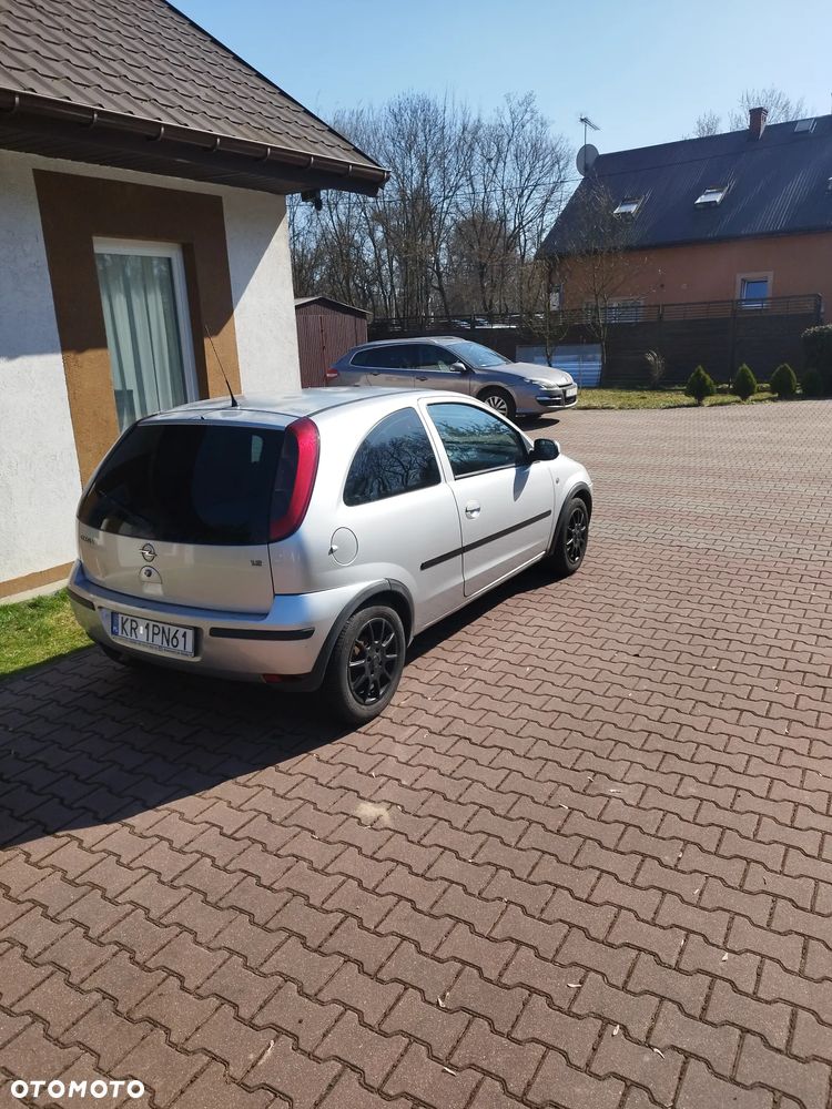 Opel Corsa 1.2 16V Cosmo - 8