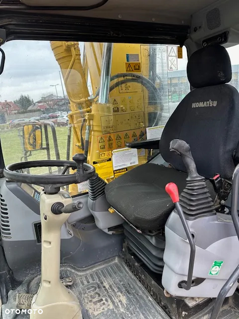 Komatsu PW 140 - 7 - 9