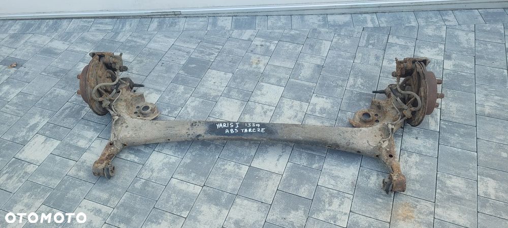 BELKA ZAWIESZENIA TARCZE TOYOTA YARIS I
