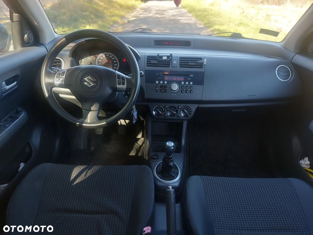 Suzuki Swift 1.3 Club - 11