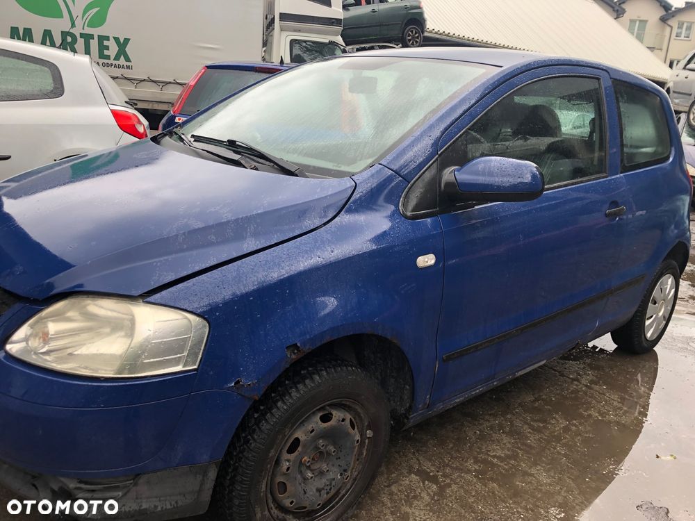 Lampa przód prawa lewa Volkswagen FOX 2007 r. - 2
