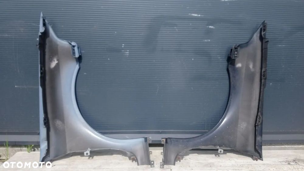 BŁOTNIK LAGUNA II PRAWY LEWY PRZÓD - 4