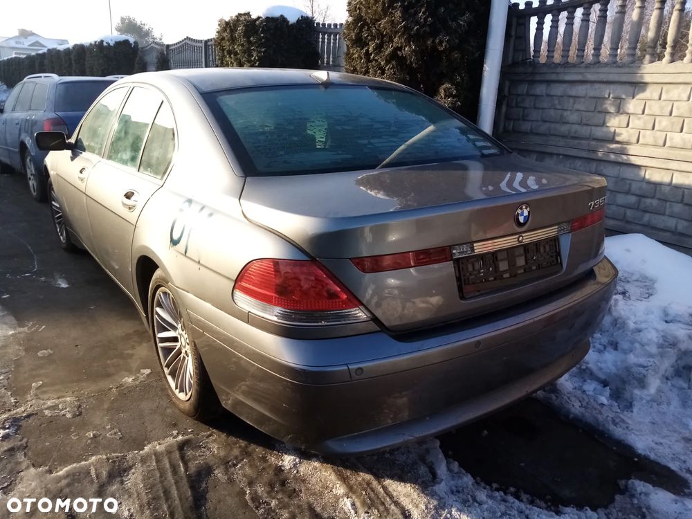 BMW E65 735i 3.6 N62B36A  01 - 05 - ZWROTNICA PRZÓD LEWA PRAWA - 10