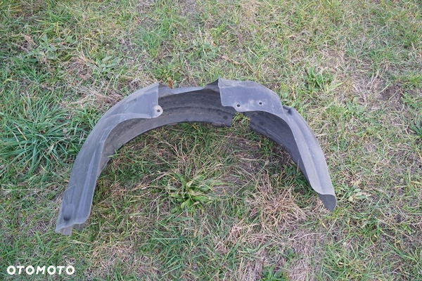 Nadkole lewe przednie Ford Fiesta MK7 8A61-16115-AD