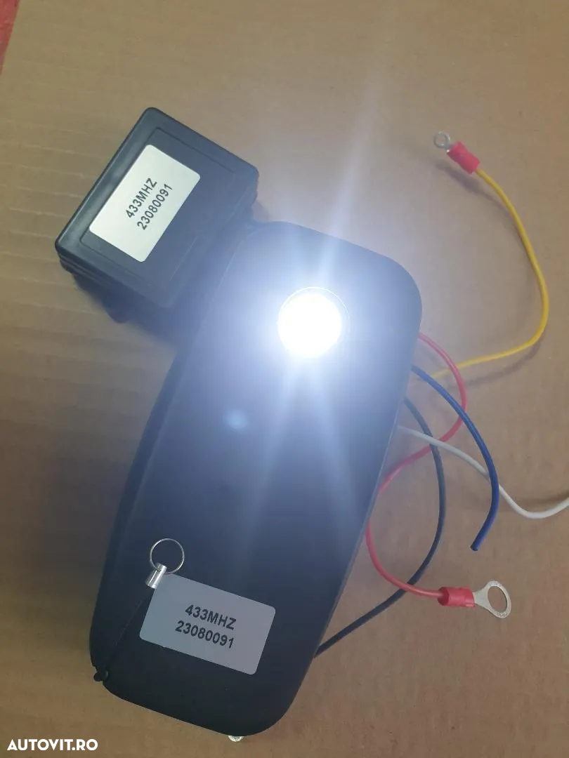 Telecomanda fara fir universala,profesionala cu led si husa antisoc  la 12-24 V - 4
