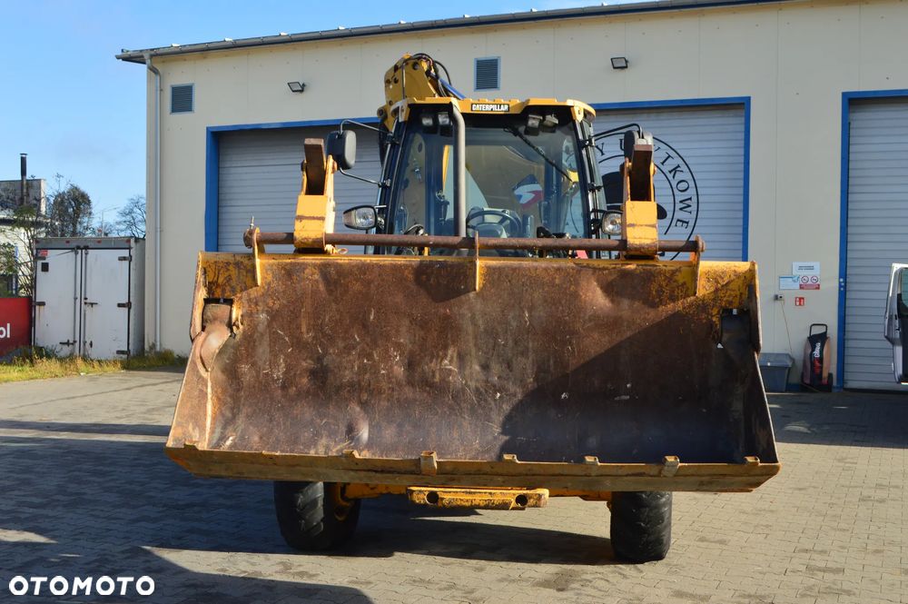 Caterpillar 428E - 8