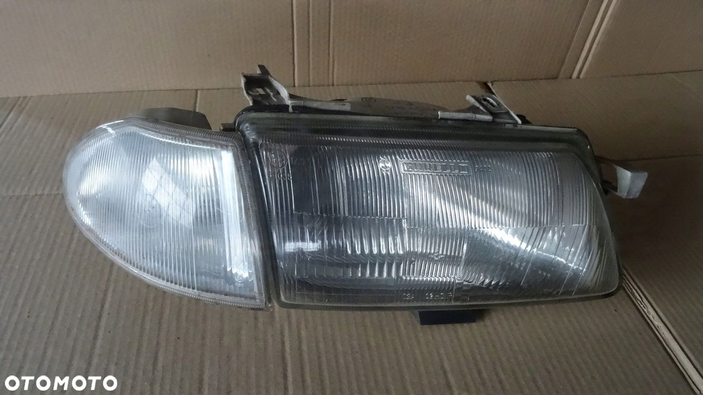 ASTRA 1 I F REFLEKTOR PRAWY PRZÓD 90383783 - 7