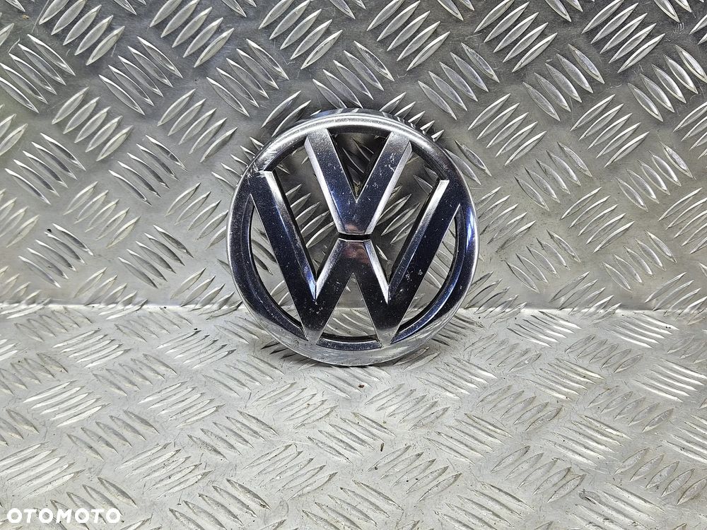 VW TOUAREG 7P 10-18R EMBLEMAT ZNACZEK LOGO GRILA PRZOD 7P6853601 A - 1