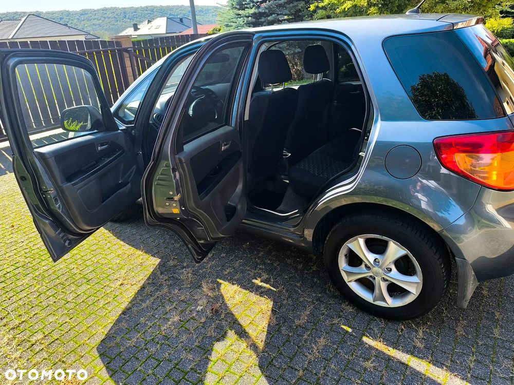 Suzuki SX4 1.6 GLX / Comfort - 9