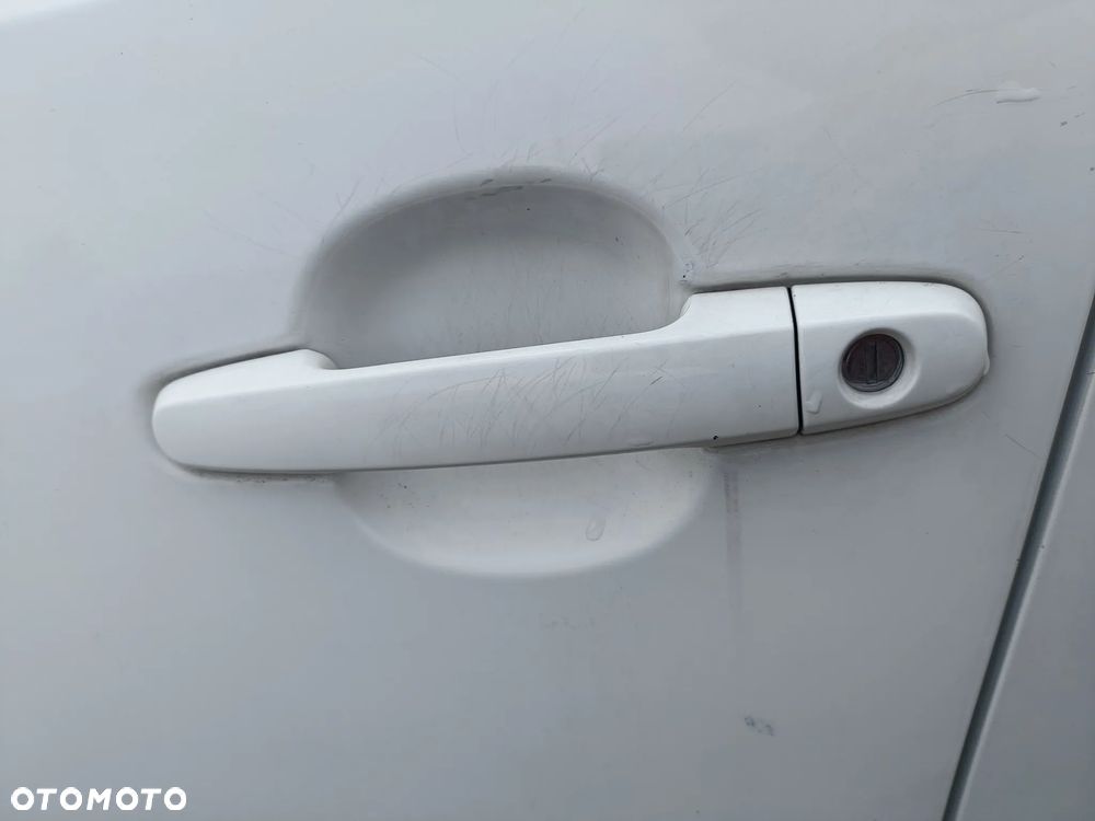 DAIHATU SIRION II 04-10 r. W09 DRZWI lewy przód lewe ** - 7