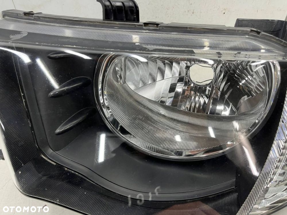 Lampa reflektor Mitsubishi L200 KA KB 05-10r. LEWA przednia H4 oryginalna lewy przód EU 8301b461 - 6
