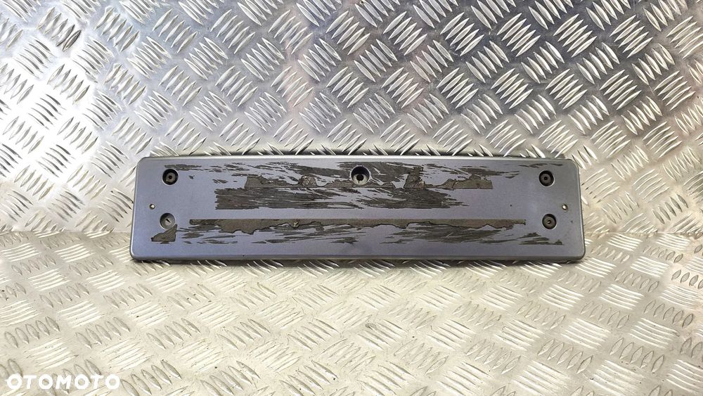 VW TOUAREG 7L 03-09R PODKLADKA PODSTAWA TABLICY REJESTRACYJNEJ LD7Z PRZOD 7L6807287 H - 1