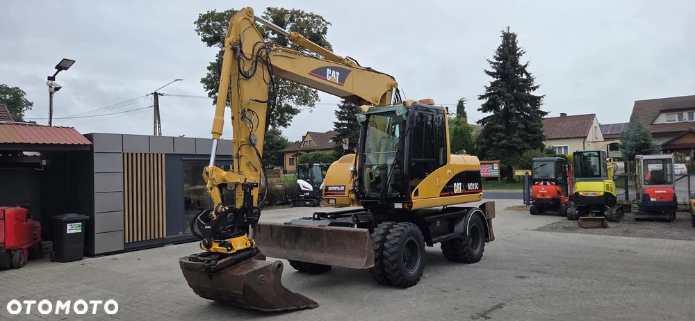 Caterpillar <<CAT M313C, Rotatilt Engcon z 2017r szczypce, szybka skrzynia, centralne smarowanie,TOP!!>> - 2