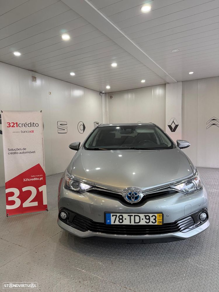 Toyota Auris 1.8 HSD Comfort+P.Sport - 1