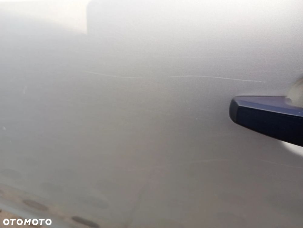 OPEL CORSA D 5d drzwi lewe tylne lewy tył Z157 srebrne - 5