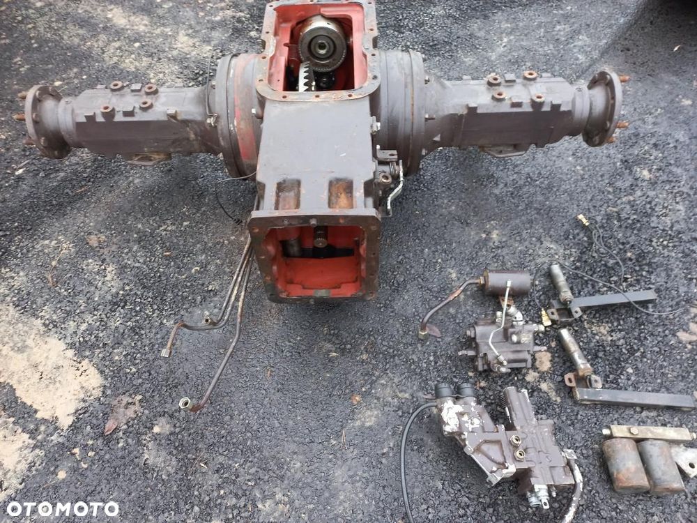 New Holland tylny most 5167252,obudowa ,zwolnica,półoś,rozdzielacz,atak,sworzeń siły uciągu,układ planetarny,5154645,fiat,F110,F130,F140,TM120,8160,M135 FORD,0538009531,5152331,5157158,HAMULCE,tarcza,7840,8240,SILNIK 6 cylindrów pompa wtryskowa,ga401,sl,sle,chłodnica łoże,kołyska,wał,blok. - 1