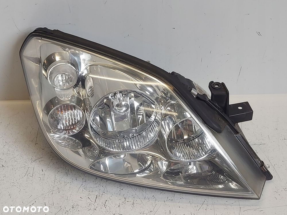NISSAN PRIMERA P12 01- LAMPA PRAWA PRZÓD HELLA EUR - 1