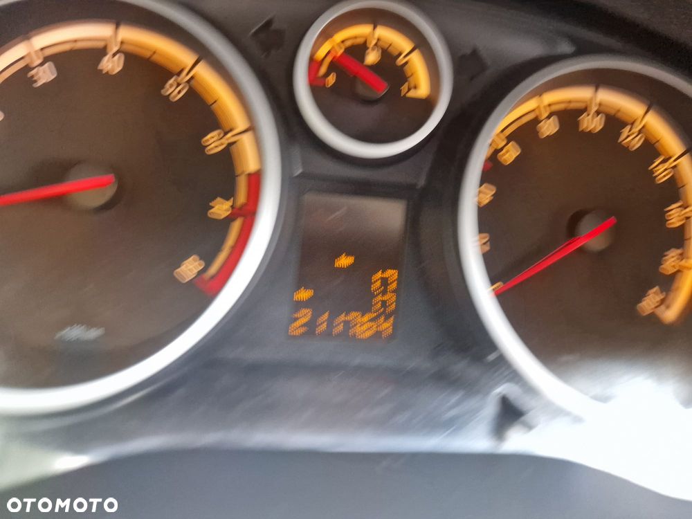 Opel Corsa 1.2 16V Enjoy - 10