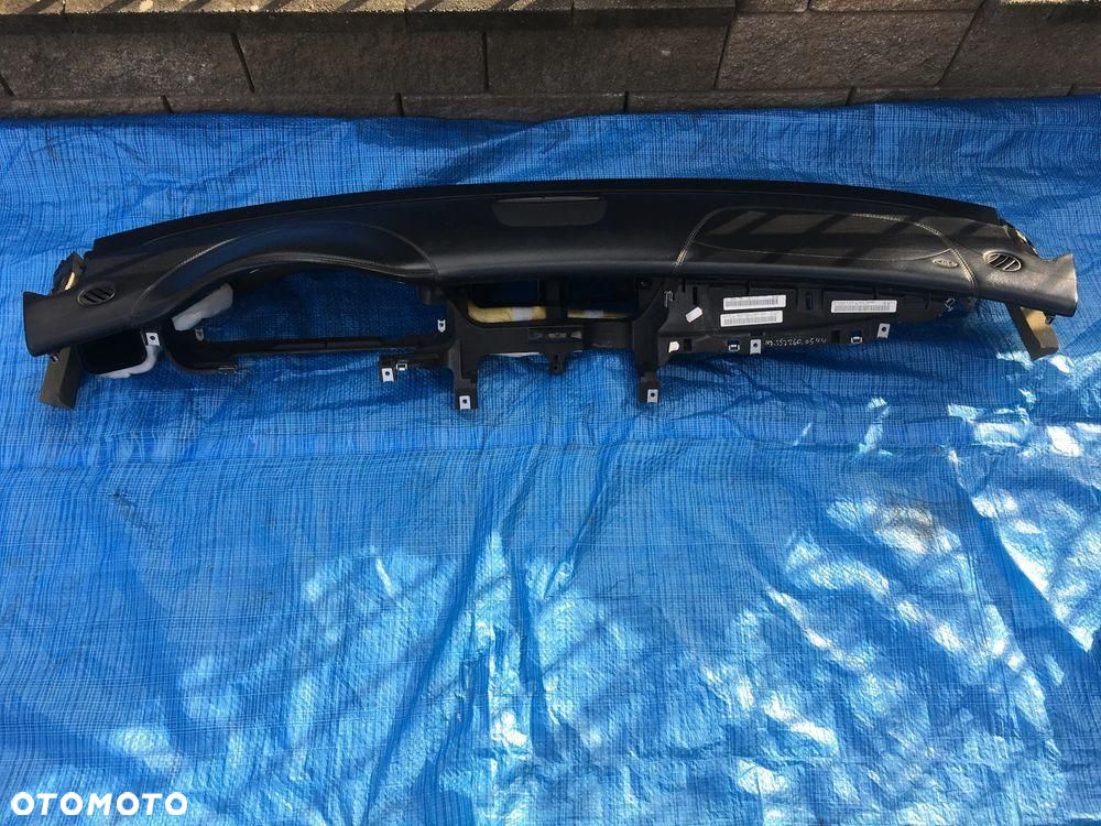 Mercedes CLS W219 / Konsola Skóra / Demontaż / 2006 - 1