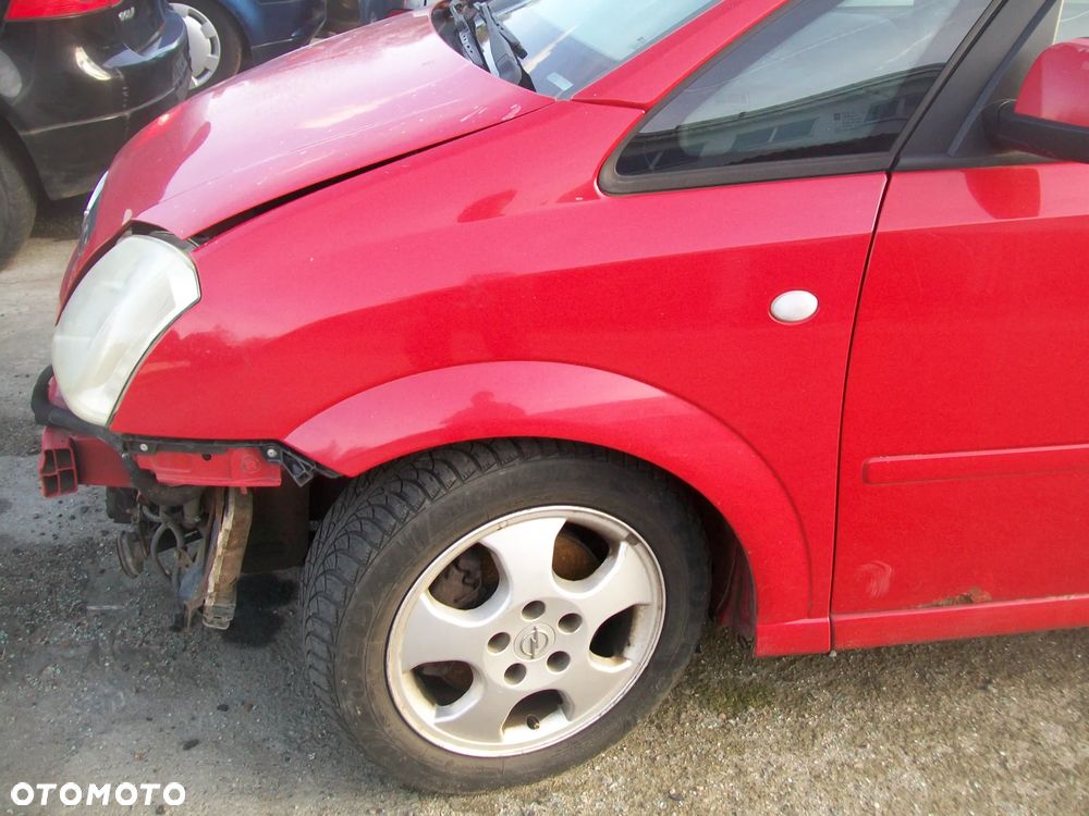 blotnik lewy opel meriva a