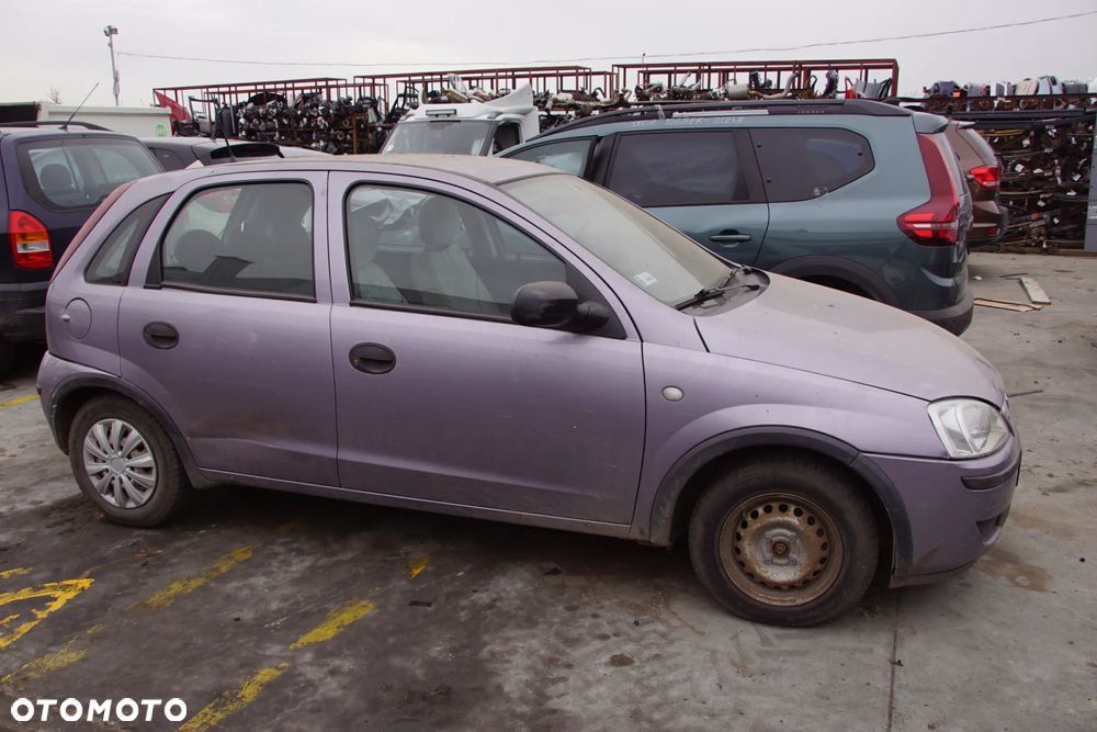 Auto na części - Opel Corsa C Lift 1.2 80 KM Z12XEP F13 4OU 2004R Silnik Skrzynia Drzwi Maska Błotnik Klapa Zderzak Lusterko Lampa Klamka Szyba Deska Kokpit Sterownik Moduł Czujnik Licznik Panel Wyświetlacz Kierownica - 2