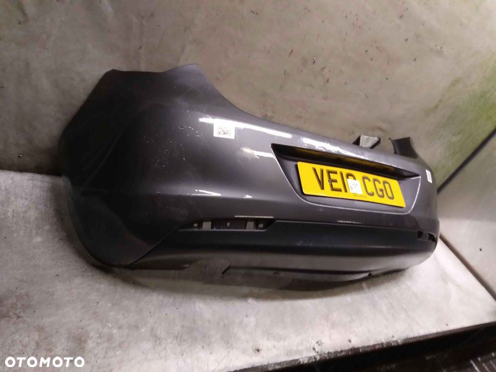 / ZDERZAK TYŁ TYLNY OPEL ASTRA J 4 IV Z177 SZARY GRAFITOWY HB - 2