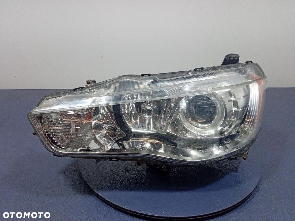 MITSUBISHI OUTLANDER II 10-12 REFLEKTOR XENON BIXENON LEWY PRZÓD P8597 - 1
