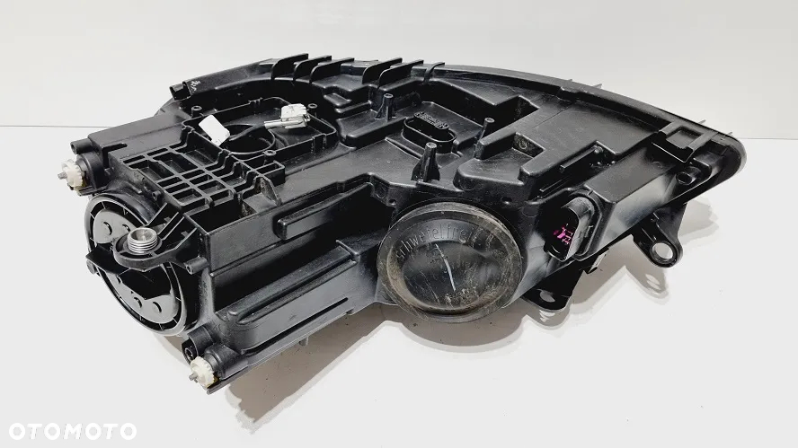 REFLEKTOR PRAWY XENON VW JETTA II LIFT 5C7 EUROPA - 5