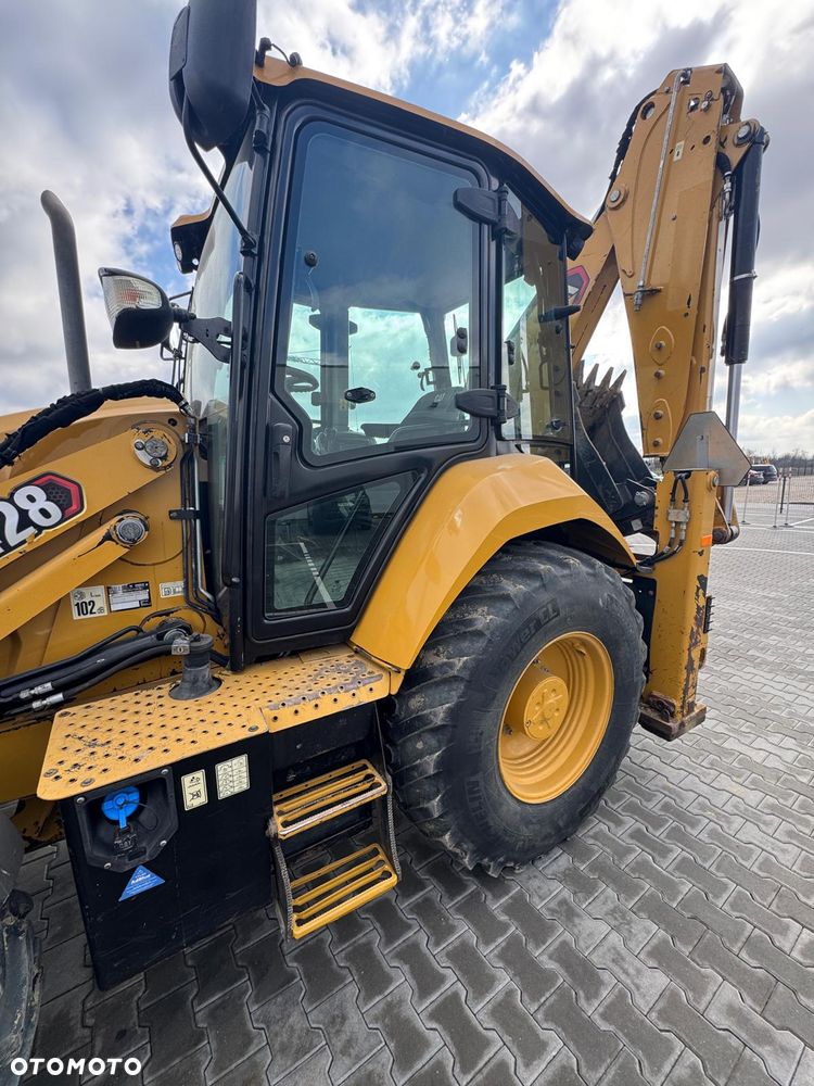 Caterpillar 428 - 13