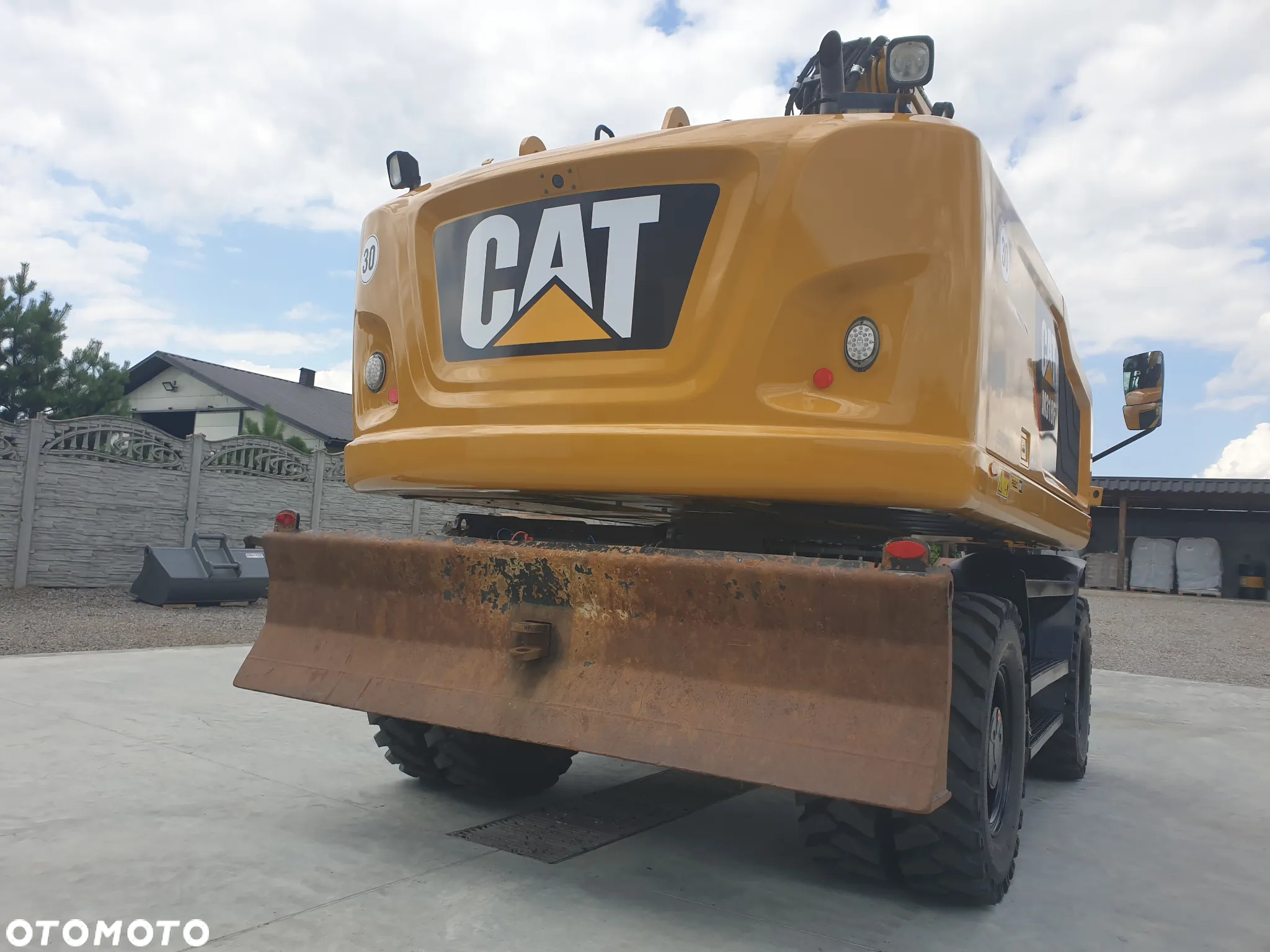 Caterpillar M 318 F ROTOTILT SPROWADZONY ŁADNY STAN - 7