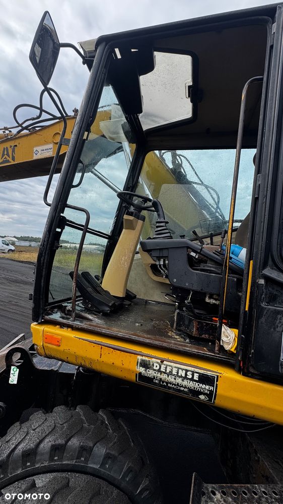 Caterpillar M312 - 8