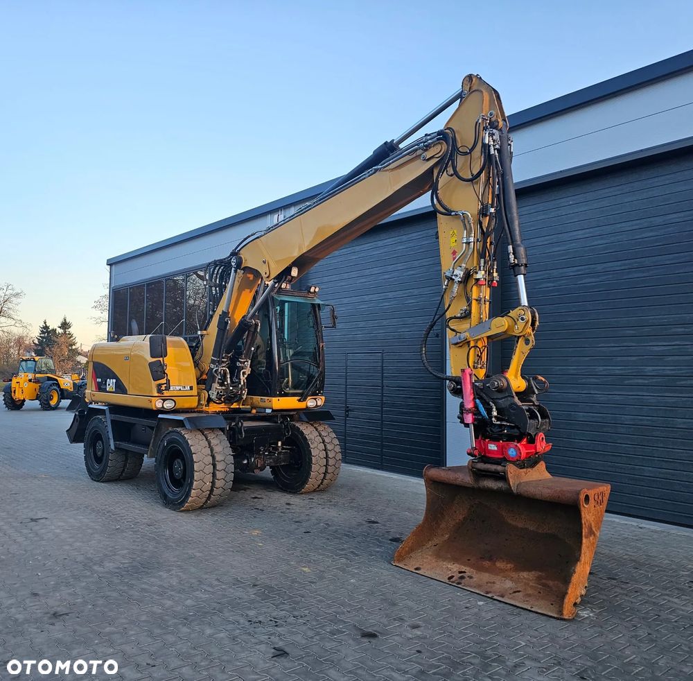 Caterpillar M313D - 1