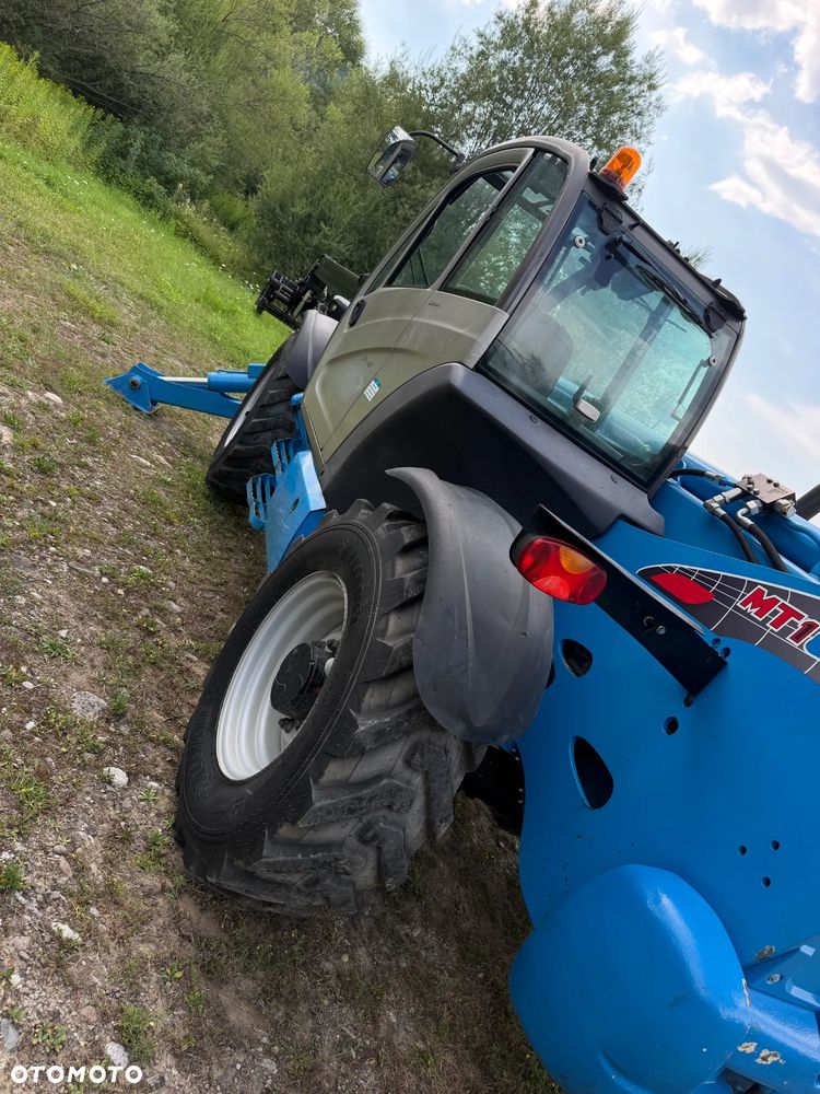 Manitou MT1440. Ładowarka Teleskopowa 14 metrów wysuw! UDŹWIG 4 TONY! Przebieg 2900 mtg. Maszyna jak Nowa z SALONU. 2017 rok. z Norwegii z Gospodarstwa rolnego! Silnik PERKINS Turbo 110 km. Aktualne Serwisy w Dekra. Nowy Model sterowane wszystko z 1 dżojstika. Ani deka luzów czy wycieku. OKAZJA! Jazda REWERS + 4 biegi. Skręt 3 tryby. Wyjście Hydrauliczne na maszcie, Poziomowanie ośi stabilizatory! Wyjścia Hydrauliczne na maszt! Okazja Ani deka luzów i wycieków. Wersja Norweska. Wielka Okazja - 25