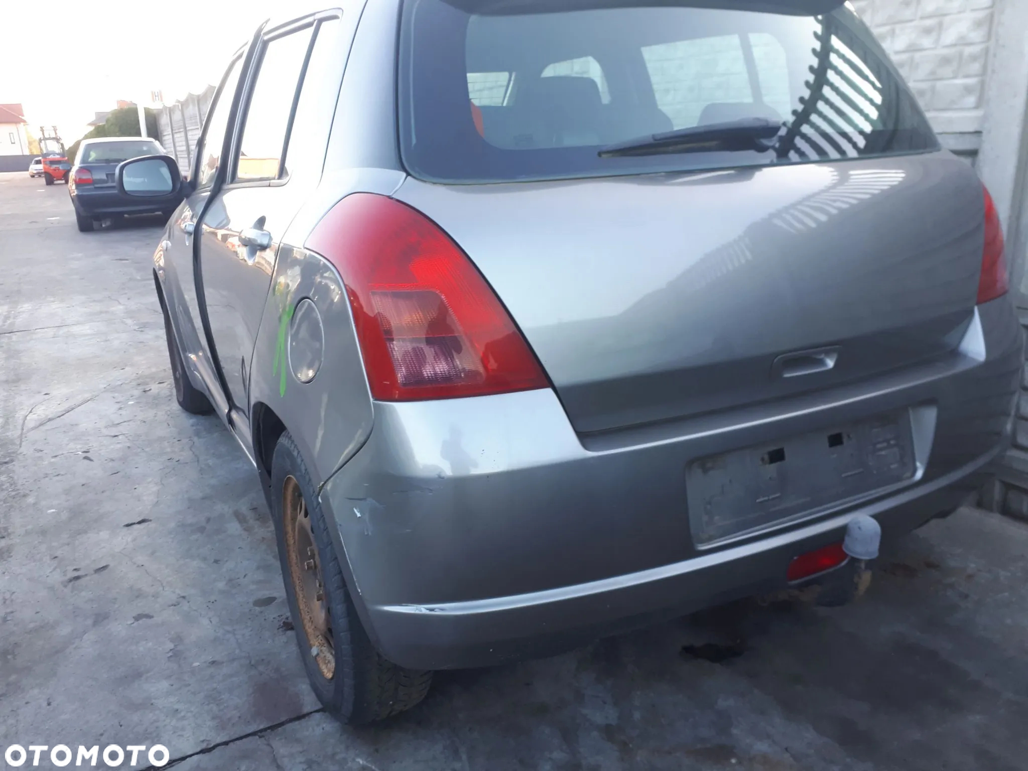 SUZUKI SWIFT 04-08 BŁOTNIK PRZÓD PRZEDNI PRAWY LEWY - 9
