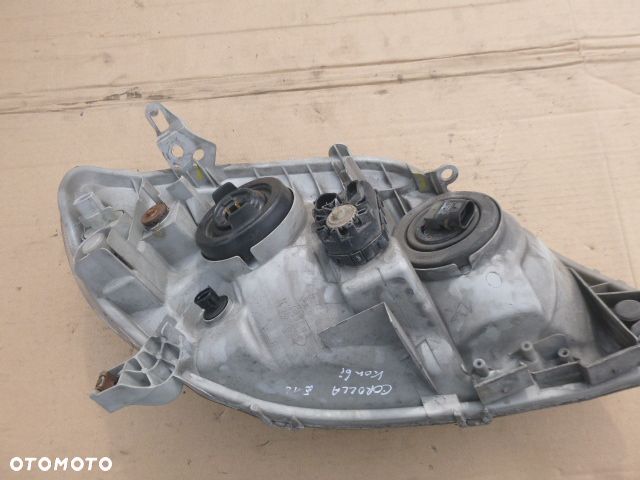 LAMPA LEWY PRZÓD LEWA PRZEDNIA TOYOTA COROLLA E12 01- - 19