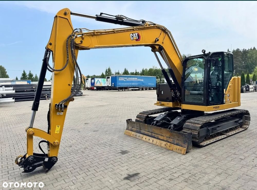 Caterpillar 310 - 6