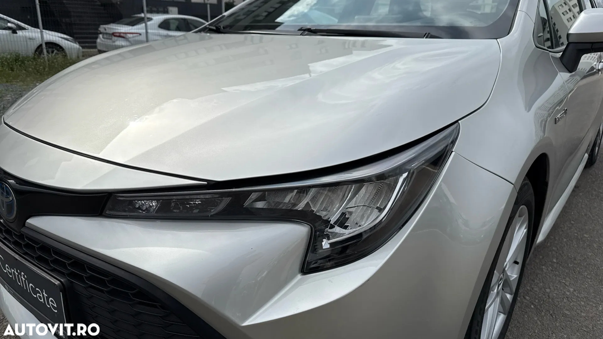 Toyota Corolla TS 1.8 HSD Business - 8