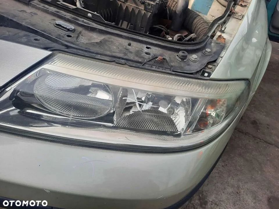Renault Laguna  lampa przednia lewa, prawa - 2