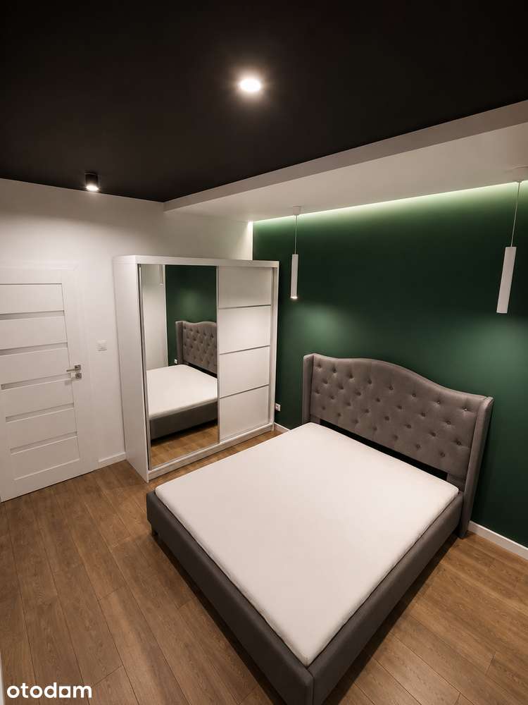 Loft po remoncie, ceglane ściany, Praga Północ